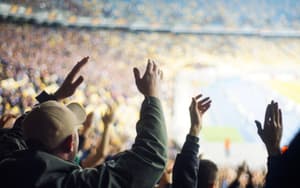 Stands full of sports fans in a stadium